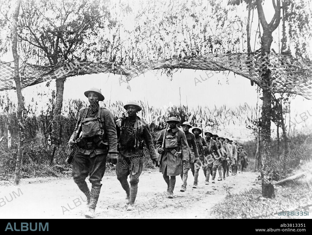 U.S. Army Infantry troops, African-American unit, marching northwest of Verdun, France. Unknown photographer dated November 5, 1918. Verdun was the site of a major battle of the First World War. The U.S. armed forces remained segregated through World War I. Still, many African Americans eagerly volunteered to join the Allied cause following America's entry into the war. By the time of the armistice with Germany on November 1918, over 350,000 African Americans had served with the American Expeditionary Force on the Western Front. One of the most distinguished units was the 369th Infantry Regiment, known as the "Harlem Hellfighters", which was on the front lines for six months, longer than any other American unit in the war. 171 members of the 369th were awarded the Legion of Merit.