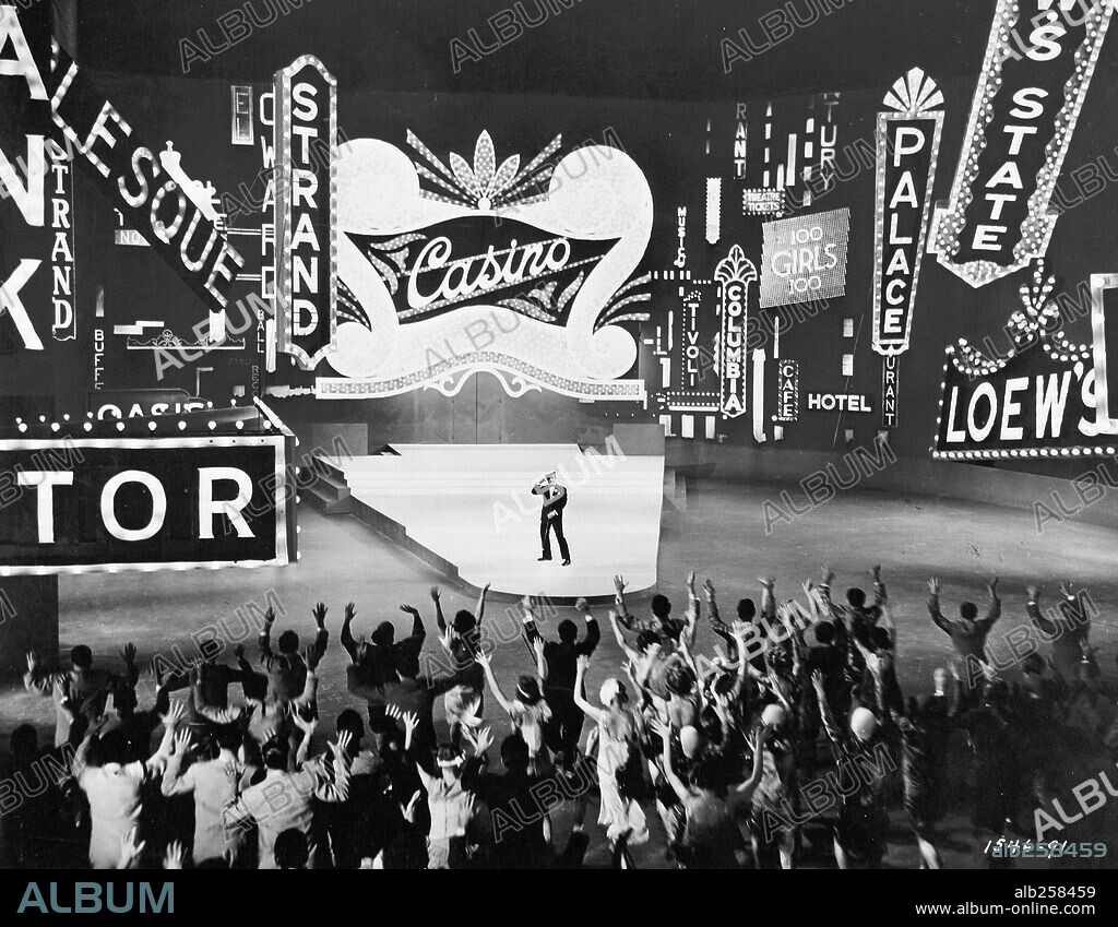 GENE KELLY in SINGIN' IN THE RAIN, 1952, directed by GENE KELLY and STANLEY DONEN. Copyright M.G.M.
