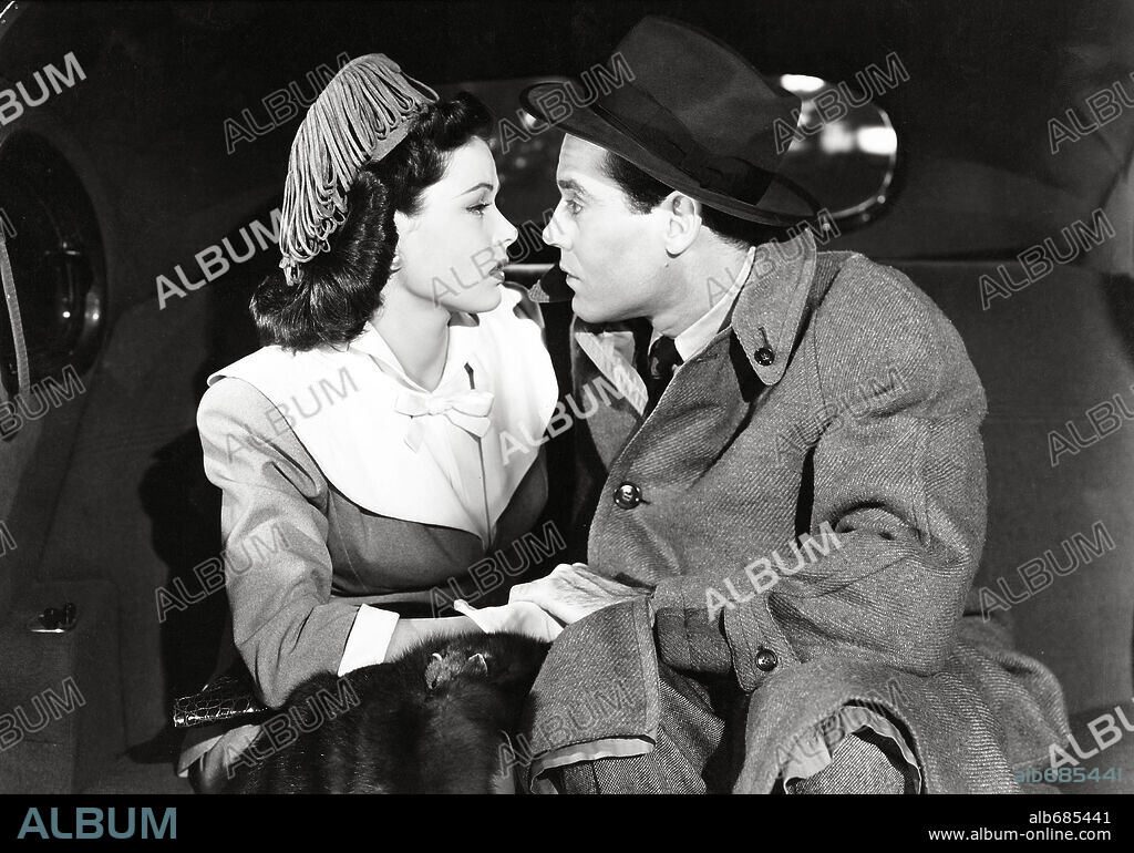 GENE TIERNEY and HENRY FONDA in RINGS ON HER FINGERS, 1942, directed by ROUBEN MAMOULIAN. Copyright 20TH CENTURY FOX.