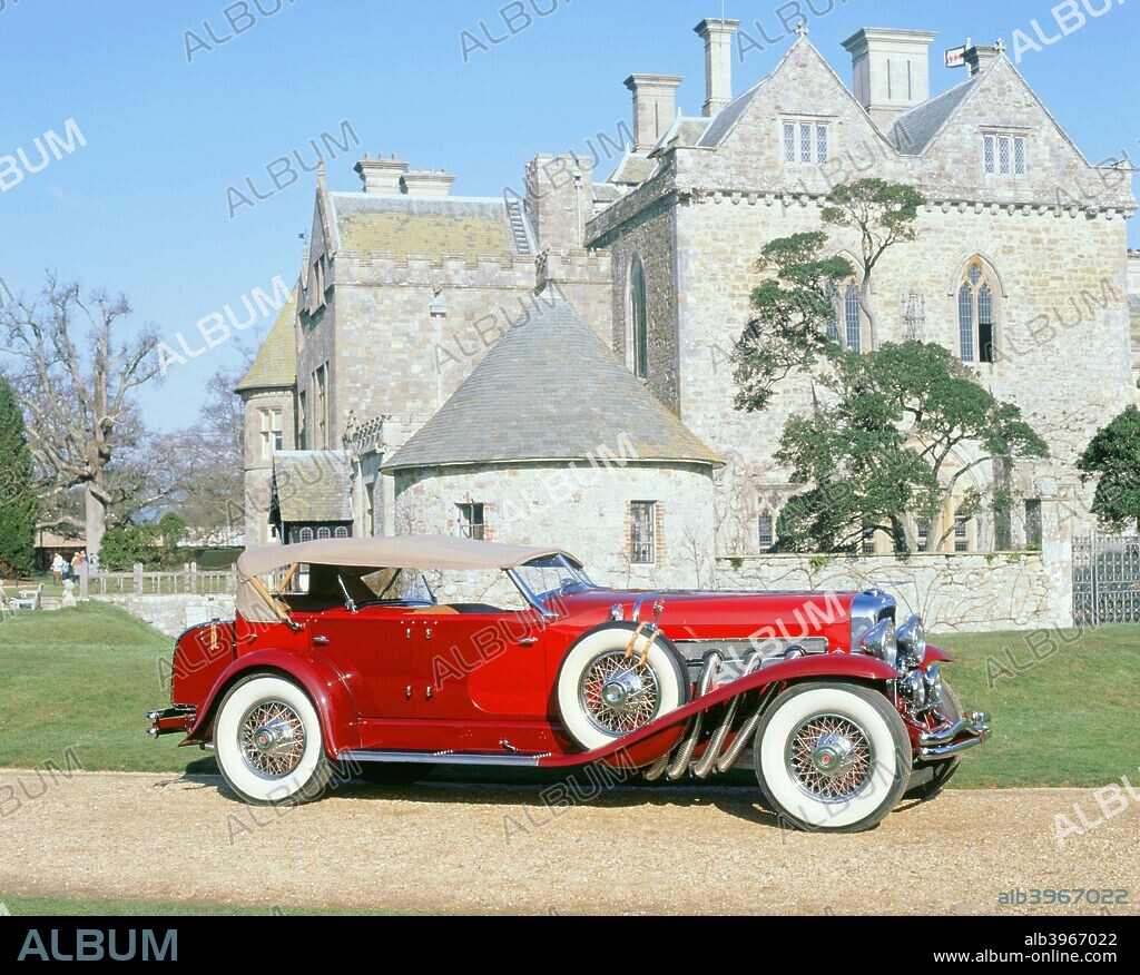 1928 Duesenberg Phaeton J Type outside Palace House, Beaulieu, Hampshire.