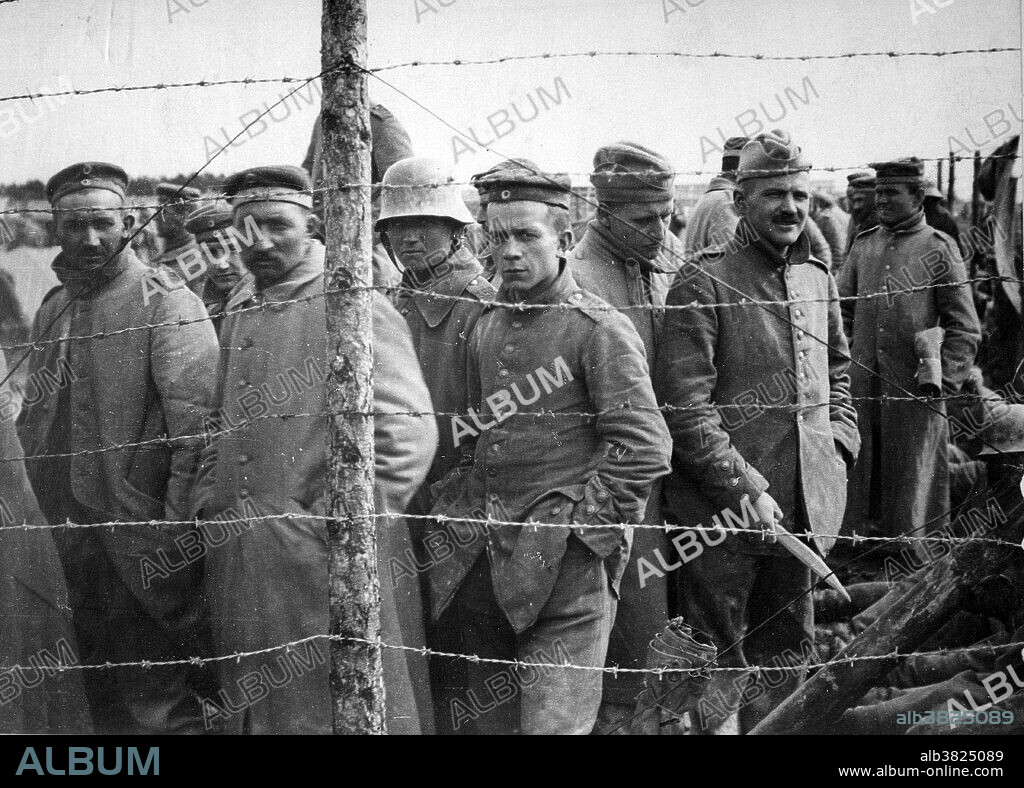 German prisoners in an unidentified French prison camp. A prisoner of war is a person, whether combatant or non-combatant, who is held in custody by an enemy power during or immediately after an armed conflict. During WWI, about 8 million men surrendered and were held in POW camps until the war ended. All nations pledged to follow the Hague rules on fair treatment of prisoners of war, and in general the POWs had a much higher survival rate than their peers who were not captured. Individual surrenders were uncommon; usually a large unit surrendered all its men. The German Empire held 2.5 million prisoners; Russia held 2.9 million, and Britain and France held about 720,000, mostly gained in the period just before the Armistice in 1918. Photo taken by French Pictorial Service, 1917-18.