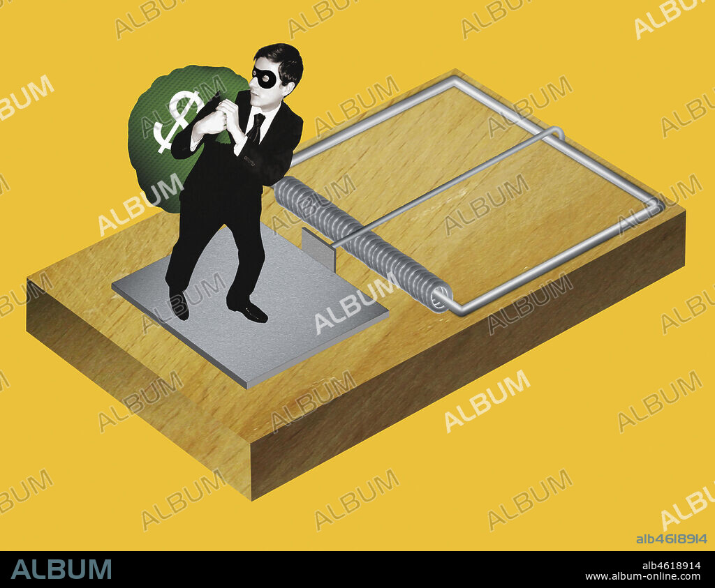 Businessman thief in mousetrap.