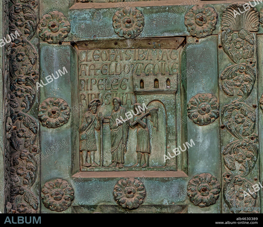 Monreale Cathedral, the gate by Bonanno Pisano (1185-6): bronze tile depicting "Supper in Emmaus" (scene of the New Testament).. The gate is signed "Bonanno civis pisanus". It depicts five scenes of the Old Testament at the bottom, starting with Adam and Eve, and five scenes of the New Testament at the top, ending in "Christ and Mary in the glory of Paradise".