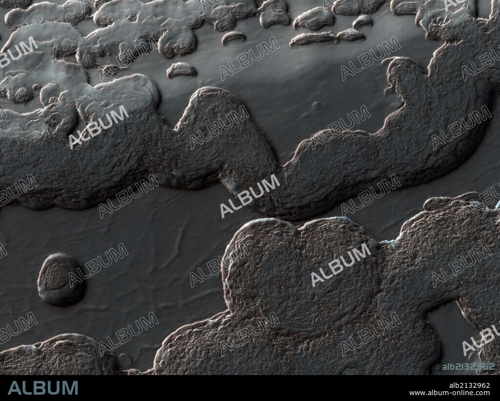 This image from NASA's Mars Reconnaissance Orbiter (MRO) shows a variety of surface textures within the south polar residual cap of Mars. (Photo by: Universal History Archive/UIG via Getty Images).