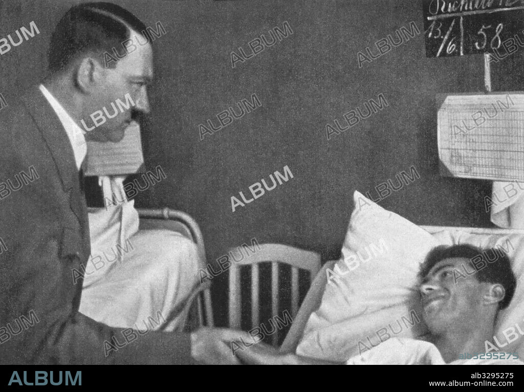 Adolf Hitler visits the victims of a munitions factory explosion at Reinsdorf. 1934.