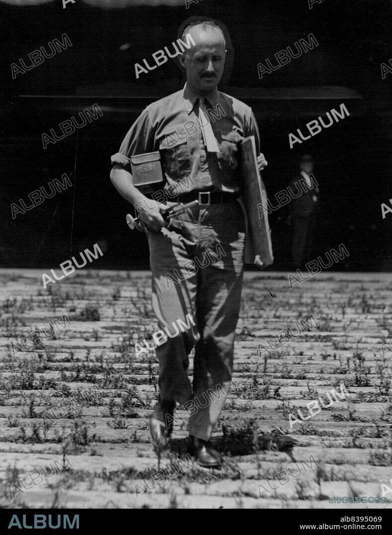 Captain P.G. Taylor, assistant pilot and madigator of the Southern Cross with makes of the Tasman Seas before leaving Mascot. January 16, 1933.