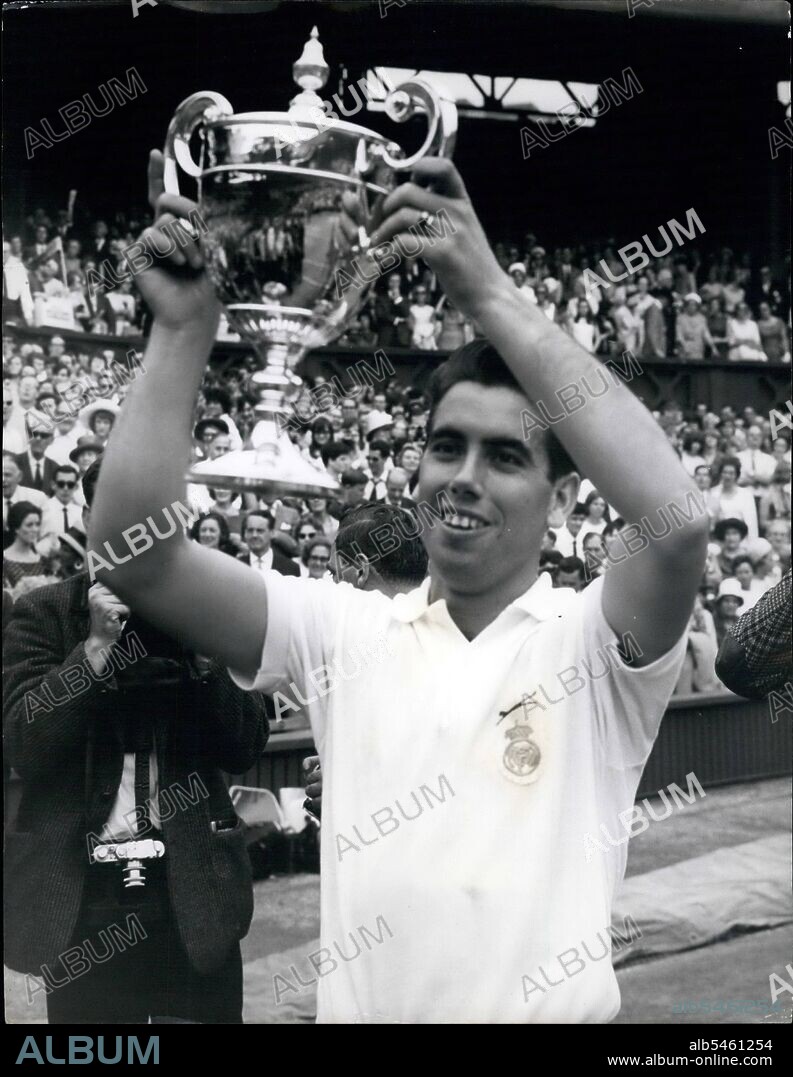 Jul. 07, 1966 - Tennis at Wimbledon. Santana wins Men's Singles final.: Photo shows Manuel Santana of Spain held the sup alert in ~~~~~ after his win over Dennis Ralston, of the United States in the Men's Singles Final at Wimbledon today, Santana won 6-4, 11-9, 6-4. (Credit Image: © Keystone Press Agency/ZUMA Wire).