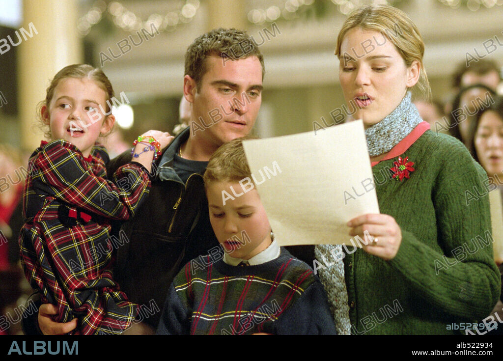 BROOKE HAMLIN, JACINDA BARRETT, JOAQUIN PHOENIX and SPENCER BERGLUND in LADDER 49, 2004, directed by JAY RUSSELL. Copyright TOUCHSTONE PICTURES.