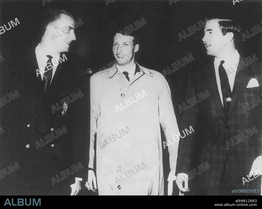 1962. Prince Juan Carlos of Bourbon and Constantine of Greece, accompany the crown prince of Norway, Harald (in the center) upon his arrival to the Greek capital invited by kings Paul and Federica.