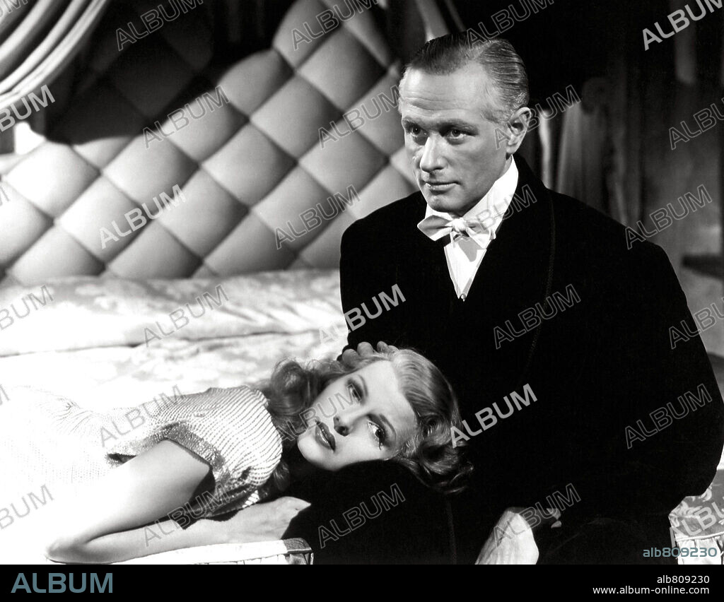 GEORGE MacREADY y RITA HAYWORTH en GILDA, 1946, dirigida por CHARLES VIDOR. Copyright COLUMBIA PICTURES.