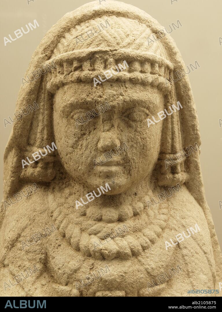 ESCULTURA IBERICA: CABEZA FEMENINA .IBERICO.(DEPOSITO: MUSEO ARQUEOLOGICO NACIONAL).