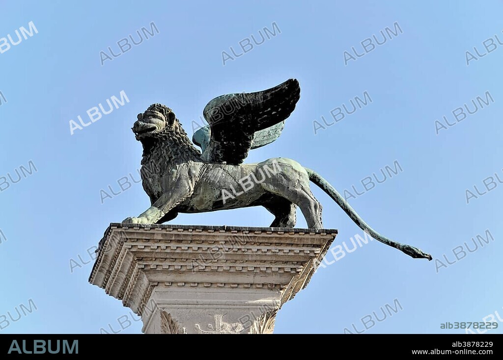 Column, capital with the winged lion of St. Mark, the patron saint of Venice, Piazzetta San Marco, St. Mark's Square, Venice, Italy, Europe.