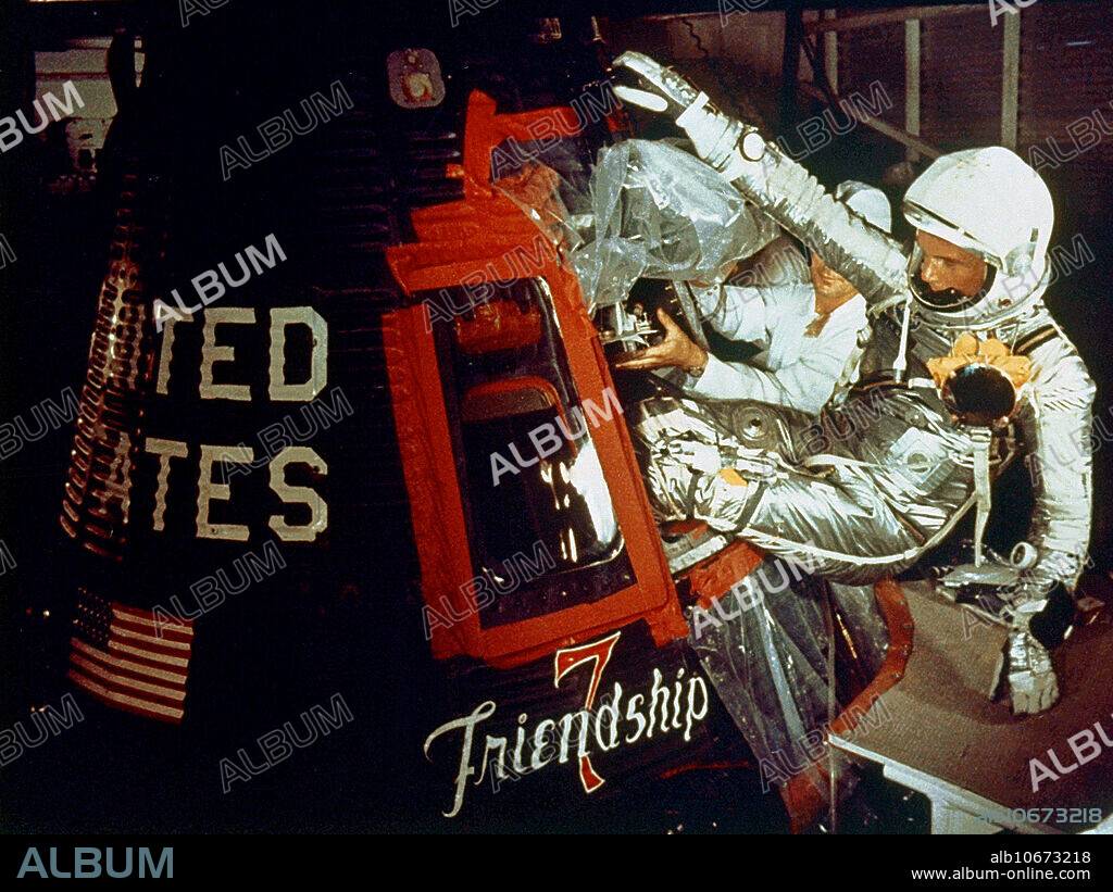 editorial use only . Astronaut John Glenn (1921-2016) climbs into the Mercury-Atlas 6 spacecraft Friendship 7 during pre-launch checkout procedures; 1962. With this mission, Glenn became the first American to orbit the Earth.