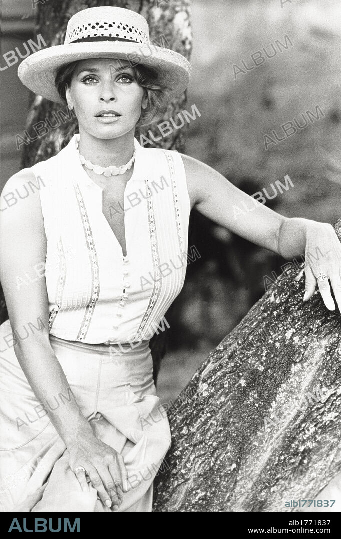 Senta Berger posing. Austrian actress Senta Berger posing on the set of the film 'The Mistress is Served' ('La padrona è servita'). Parma, 1976.
