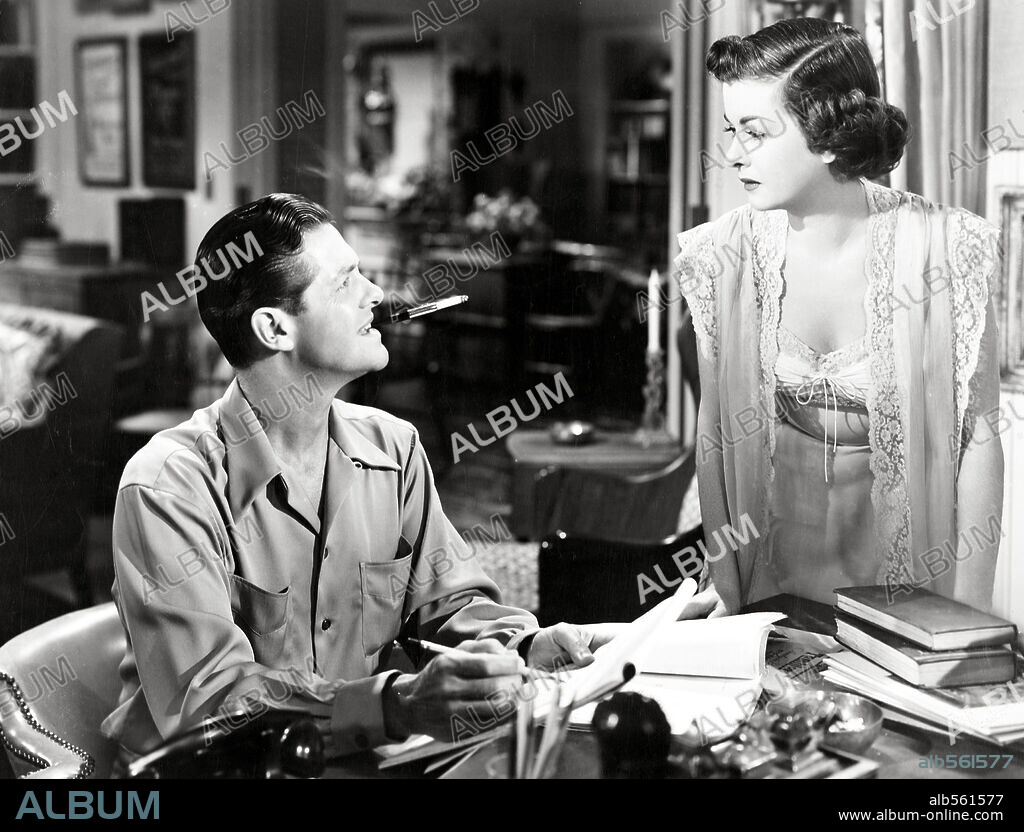 JOAN BENNETT and ROBERT CUMMINGS in FOR HEAVEN'S SAKE, 1950, directed by GEORGE SEATON. Copyright 20TH CENTURY FOX.