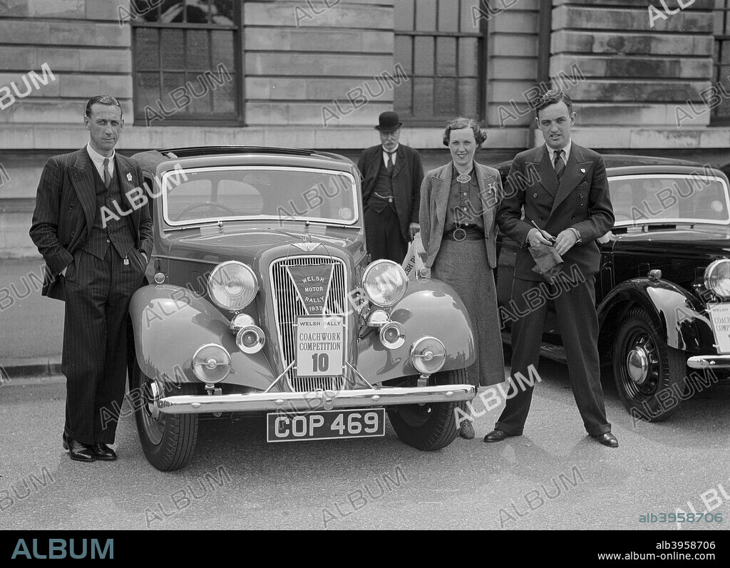 Austin 10 Saloon 1937 1125 cc. Vehicle Reg. No.  COP469.  Event Entry Nos. 10. Driver: Sewell, Capt. W.S. 10 is Coachwork Competition No. Place: S.W.A.C. Welsh Rally. Date: 30.6-3.7.37.