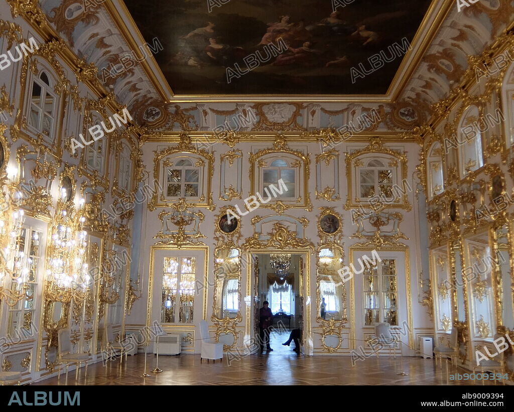 Peterhof Palace, a series of palaces and gardens located in Petergof, Saint Petersburg, Russia. Commissioned by Peter the Great as a direct response to his visit to the Palace of Versailles. In the period between 1714 and 1728, the architecture was designed by Domenico Trezzini, and the style he employed became the foundation for the Petrine Baroque style.