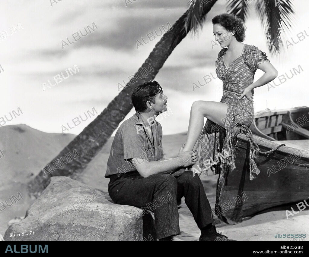 CLARK GABLE and JOAN CRAWFORD in STRANGE CARGO, 1940, directed by FRANK BORZAGE. Copyright M.G.M.