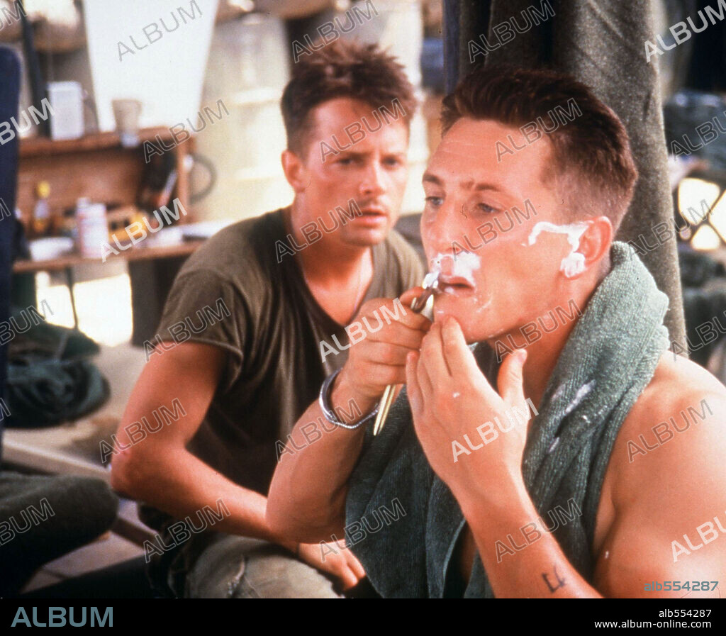 MICHAEL J. FOX and SEAN PENN in CASUALTIES OF WAR, 1989, directed by BRIAN DE PALMA. Copyright COLUMBIA TRISTAR.