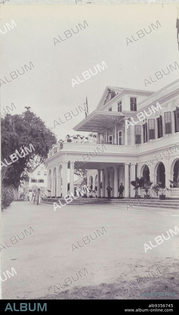 Governor's Palace at Paramaribo, View of the Governor's Palace at Paramaribo, May 1912. Part of the photo album of the Boom-Gonggrijp family in Suriname and Curaçao., Andries Augustus Boom, anonymous, Paramaribo, May-1912, photographic support, height 105 mm × width 64 mm.