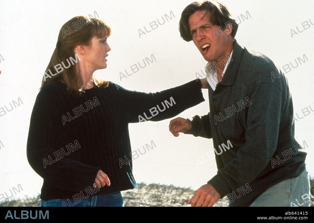 HUGH GRANT and JULIANNE MOORE in NINE MONTHS, 1995, directed by CHRIS COLUMBUS. Copyright 20TH CENTURY FOX.
