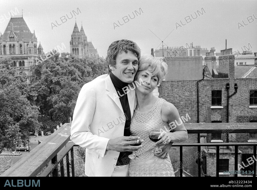 London: Pop singer Billy Fury with his fiances Judith Hall, a 29 year old model in London today. 31 July 1968.