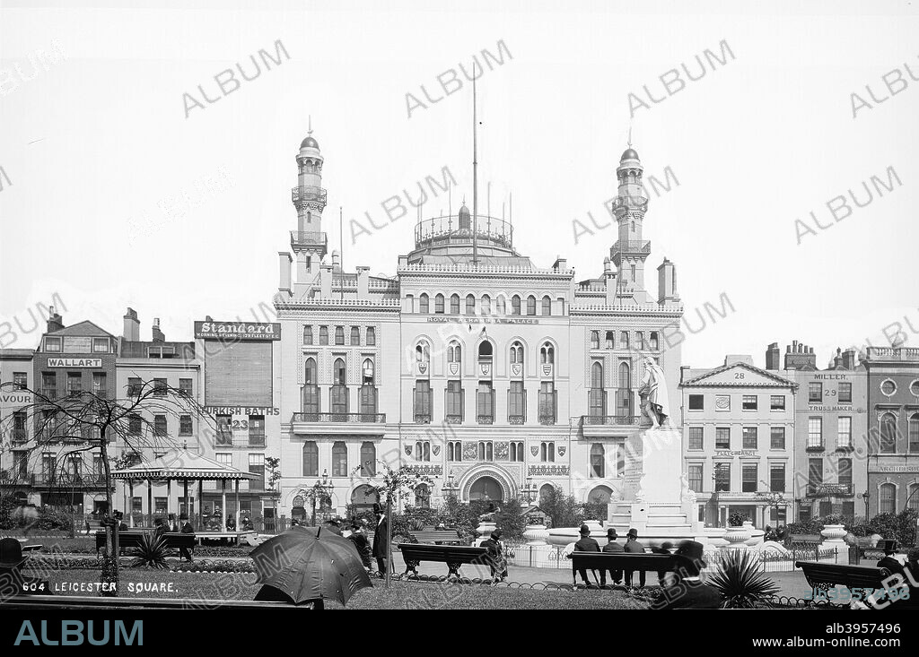 Alhambra Theatre, Leicester Square, Westminster, London 1870-1882. Wet collodion glass plate negative.  The Alhambra in London's Leicester Square was the brainchild of the impresario and showman Edward Tyrell Smith who bought it in 1858 for the staging of circus acts and later musical theatre. Its Moorish styling included domes, minarets, and horseshoe arches. A fire in 1882 led to its rebuilding, but it was demolished in 1936 as the popularity of music hall entertainment declined. It was replaced by an Odeon Cinema.