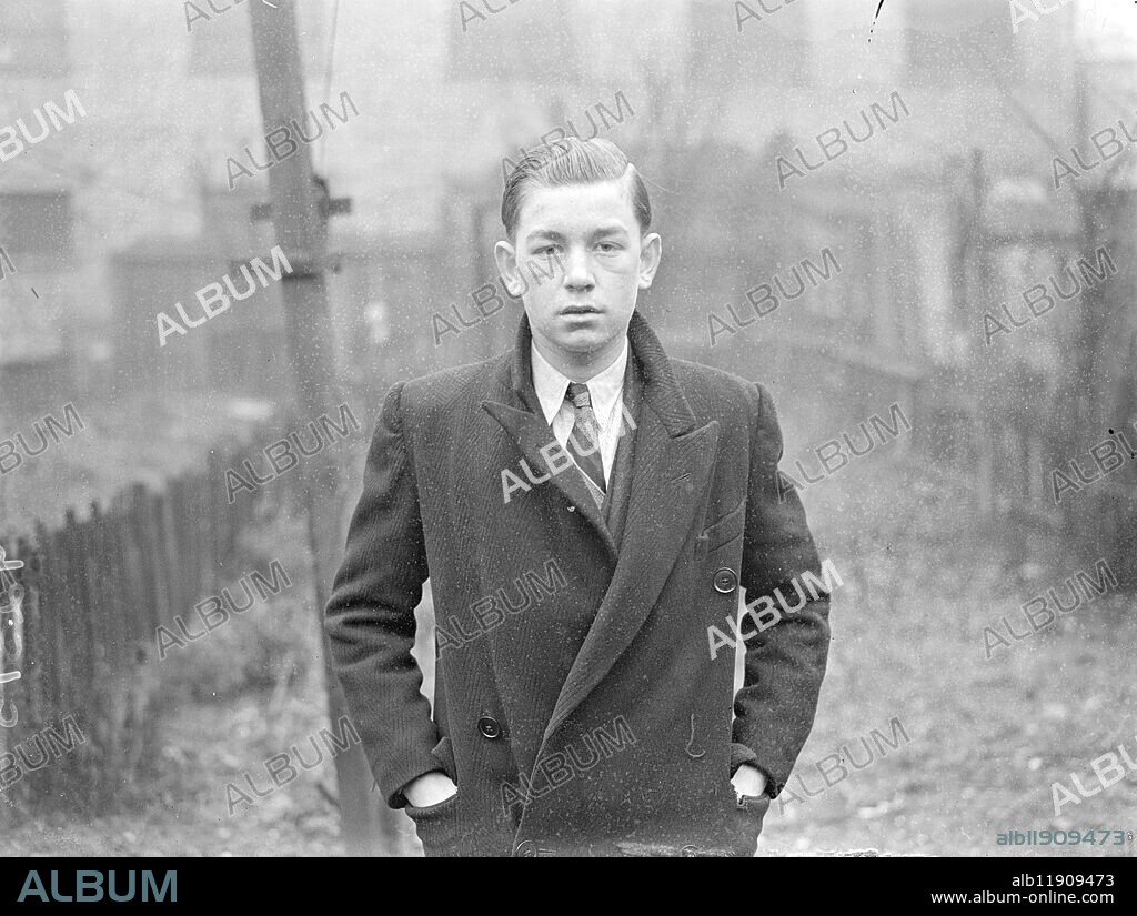 Boy of 15 gives alarm in London house fire four injured. John Davies, aged 15, gave the alarm when fire broke out at a house in New Church Road, Camberwell. His father, Arthur Davies, aged 41, his mother, Winifred Davis, aged about 40, his 11-year-old brother Ivor Davies, and Arthur George Bird a lodger were injured and in St Giles Hospital, Camberwell. John Davies says he was awakened by crackling and when he opened his bedroom door. The heat was terrific and clouds of smoke were coming up the staircase. He managed to escape without injury. 30 December 1937.