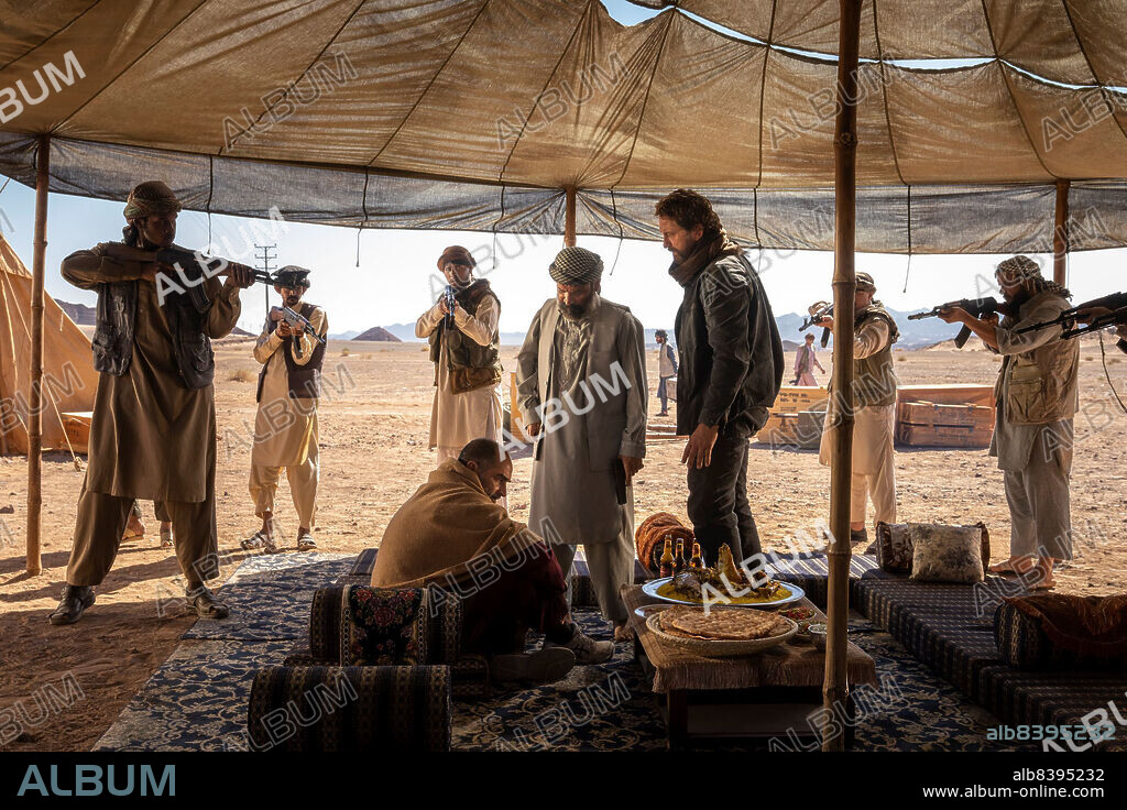 GERARD BUTLER en OPERACION KANDAHAR, 2023 (KANDAHAR), dirigida por RIC ROMAN WAUGH. Copyright Thunder Road Pictures.