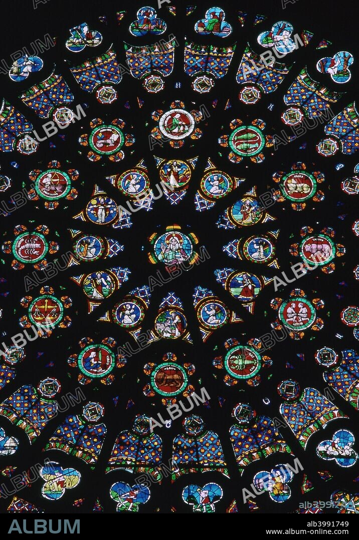 Rose window in the south transeit of St Denis in France, showing the signs of the Zodiac, 12th century.