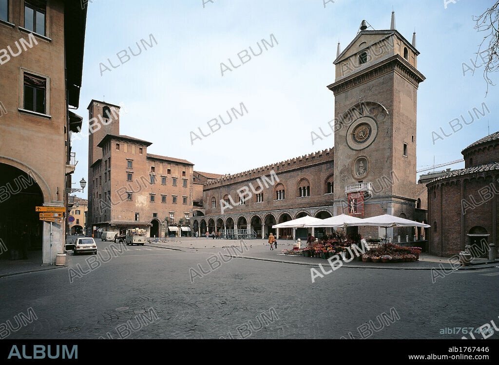 Piazza delle Erbe and Torre dellOrologio in Mantua, by Unknown Artist, Unknown creation date. Italy, Lombardy, Mantua, Piazza Erbe and Clocktower. Glimpse square piazza Erbe Rotonda clock broletto tower palazzo mansion brick market.