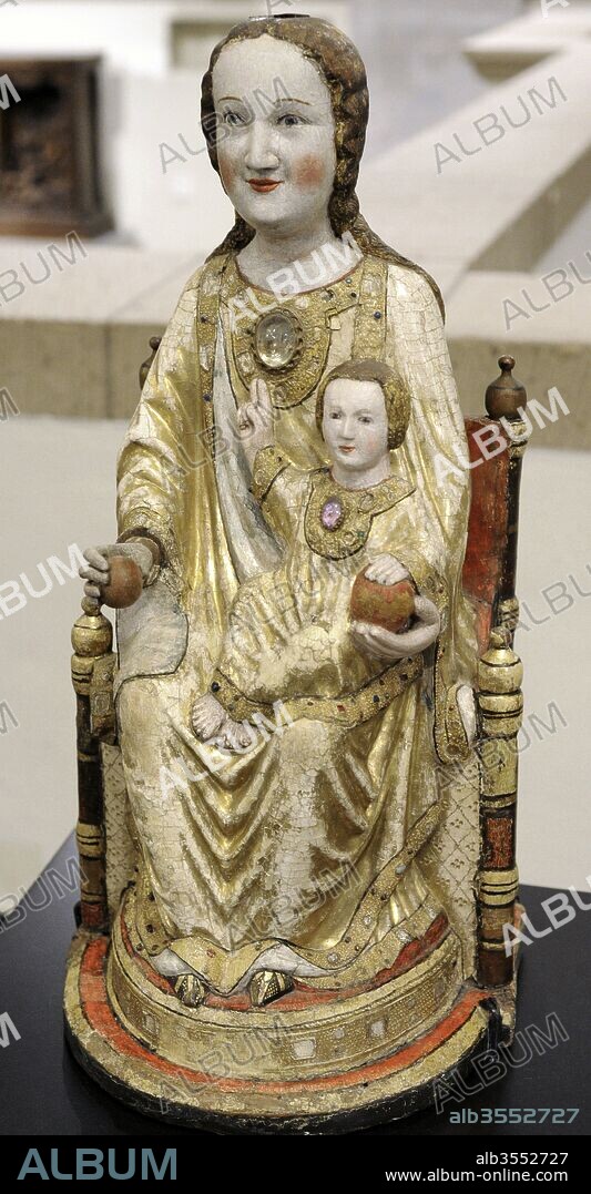 The Virgin Mary with a Rock crystal. Cologne, 1220-1230 and first half of the 14th century (polychromy). Oak and walnut, polychrome. Museum Schnu_tgen. Cologne, Germany.