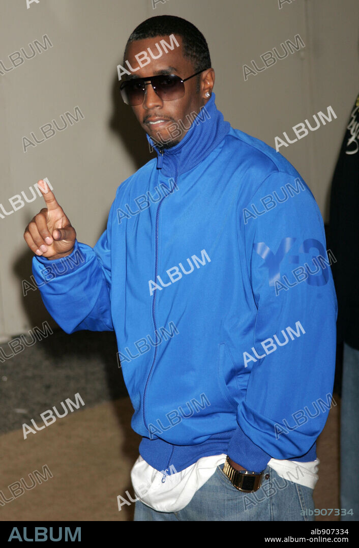 【DIRDDY】 I Am Okay With The Rain Coat - Turquoise Sean 'Diddy' Combs Seen Praying on His Knees After Verdicts