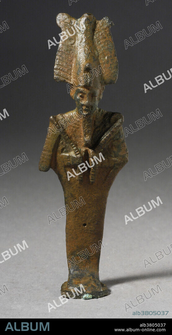 Bronze statue of Egyptian God Osiris with crook and flail, Egypt, Late Period -Roman Period (711 BC-150 AD). Osiris was an Egyptian god, usually identified as the god of the afterlife, the underworld and the dead. He was classically depicted as a green-skinned man with a pharaoh's beard, partially mummy-wrapped at the legs, wearing a distinctive crown with two large ostrich feathers at either side, and holding a symbolic crook and flail. The king and judge of the dead, the husband and brother of Isis, and father (or brother) of Horus, killed by Set but later resurrected (after Horus killed Set).