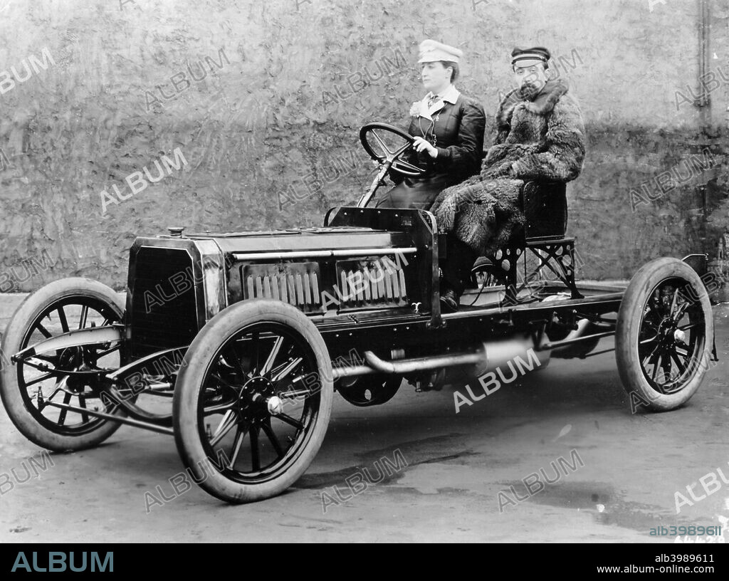 Madame du Gaste and Monsieur Barbarou in a Benz Parsifal, 1903. The new Parsifal was the first Benz with a vertical two-cylinder engine. Camille du Gaste was France's first woman racing driver.