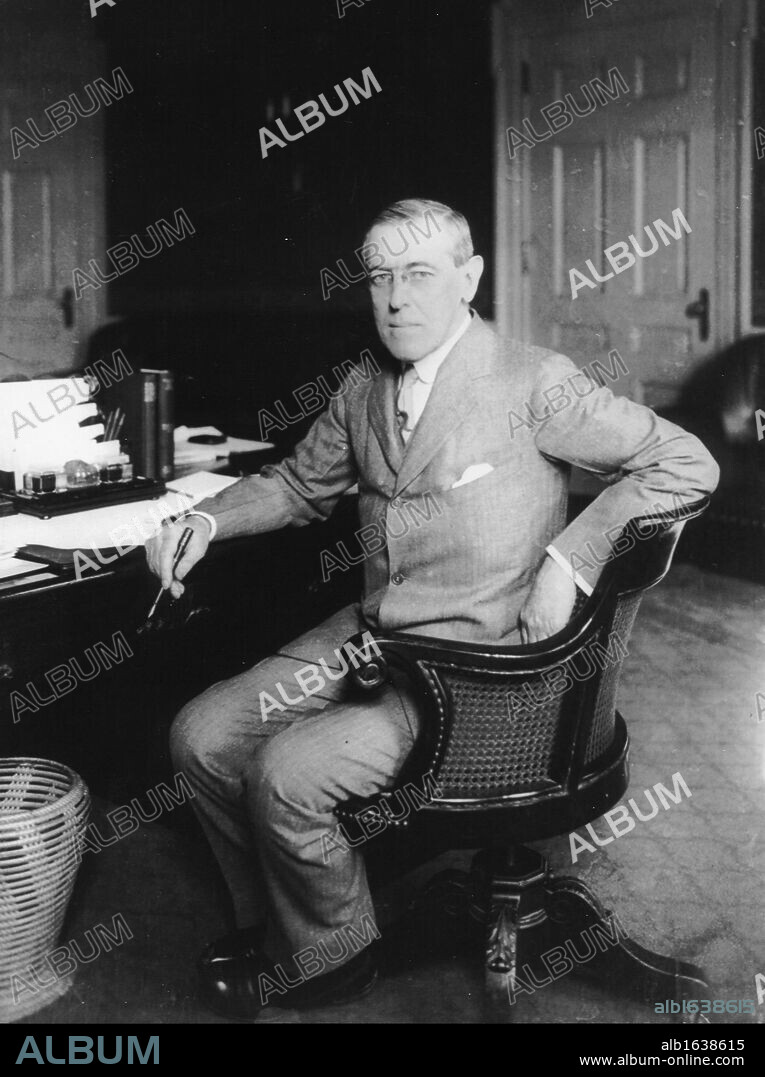 (Thomas) Woodrow Wilson (1856-1924) 28th President of the United States of America 1913-1921 throughout the First World War.  Suffered a severe stroke in October 1919 leaving him partially incapacitated.  Woodrow at his desk.