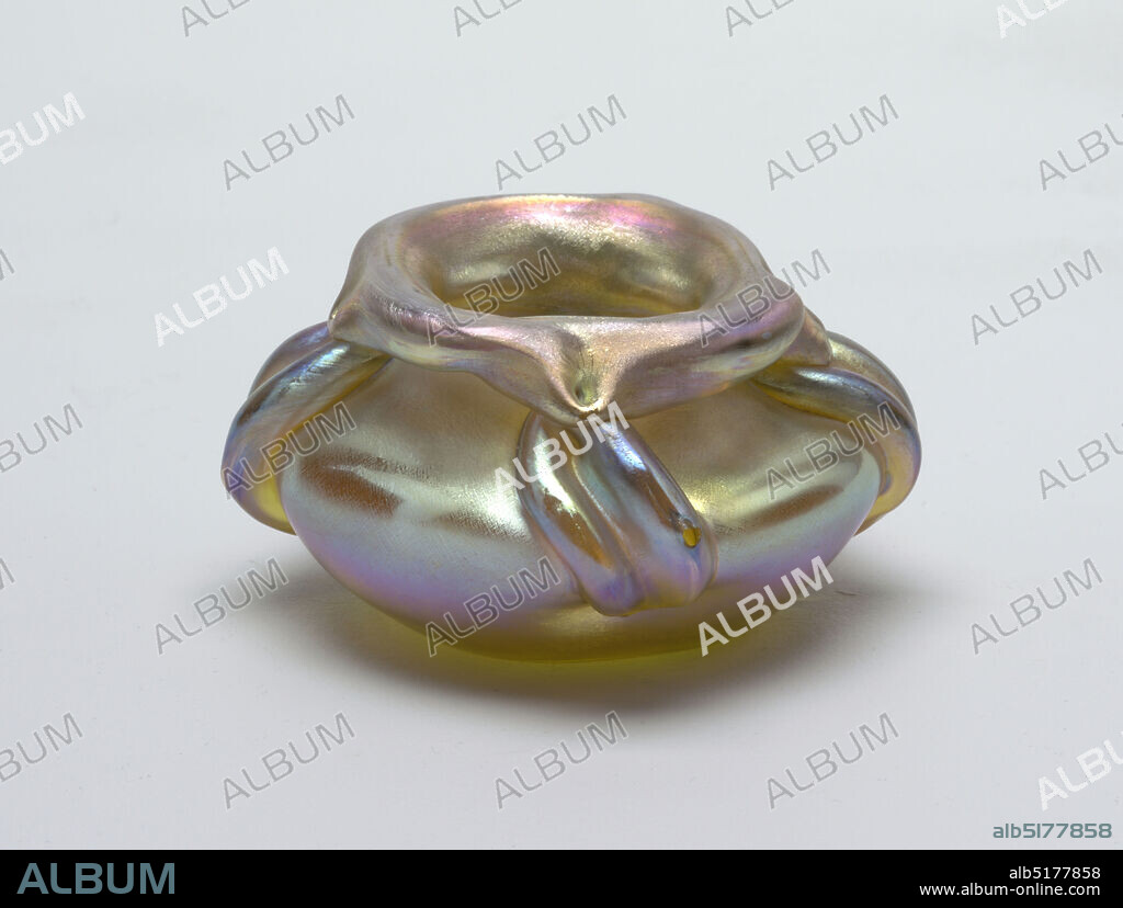Vase, Tiffany Glass and Decorating Company, American, 1892 - 1900, Free-blown favrile glass, Iridescent blue, purple and yellow. Free-blown body, depressed sphere in shape, somewhat squared in plan. Heavy, rolled-over rim from squarish opening, drawn irregularly down and attached to applied heavy double threads, accenting four corners of body, and diminishing to points, near bottom. Depressed center on underside., New York, New York, USA, ca. 1895-96, glasswares, Decorative Arts, Vase.