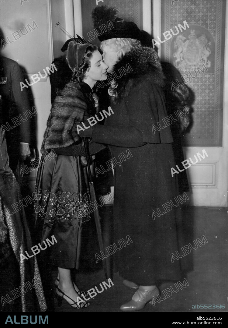 Princess Has A Kiss For Grandmother -- Princess Margaret has a kiss of welcome for her grandmother, Queen Mother Mary, as they arrive at the Royal Albert Hall, Kensington, for the British Legion Festival of Remembrance.November 10, 1951.