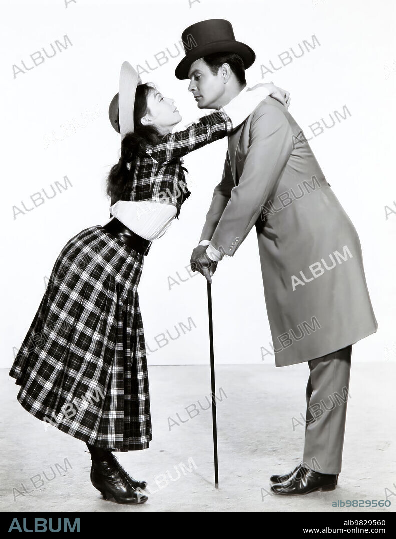 LESLIE CARON and LOUIS JOURDAN in GIGI, 1958, directed by VINCENTE MINNELLI. Copyright M.G.M.