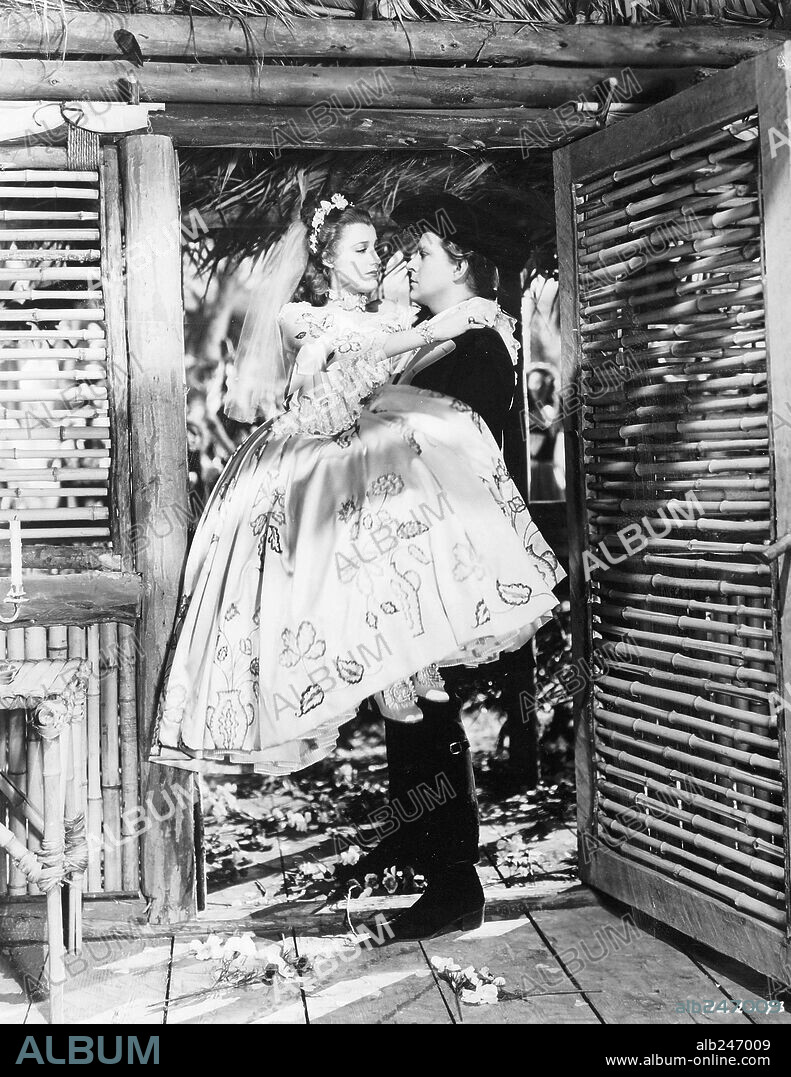 JEANETTE MACDONALD and NELSON EDDY in NEW MOON, 1940, directed by ROBERT Z. LEONARD and W. S. VAN DYKE. Copyright M.G.M.