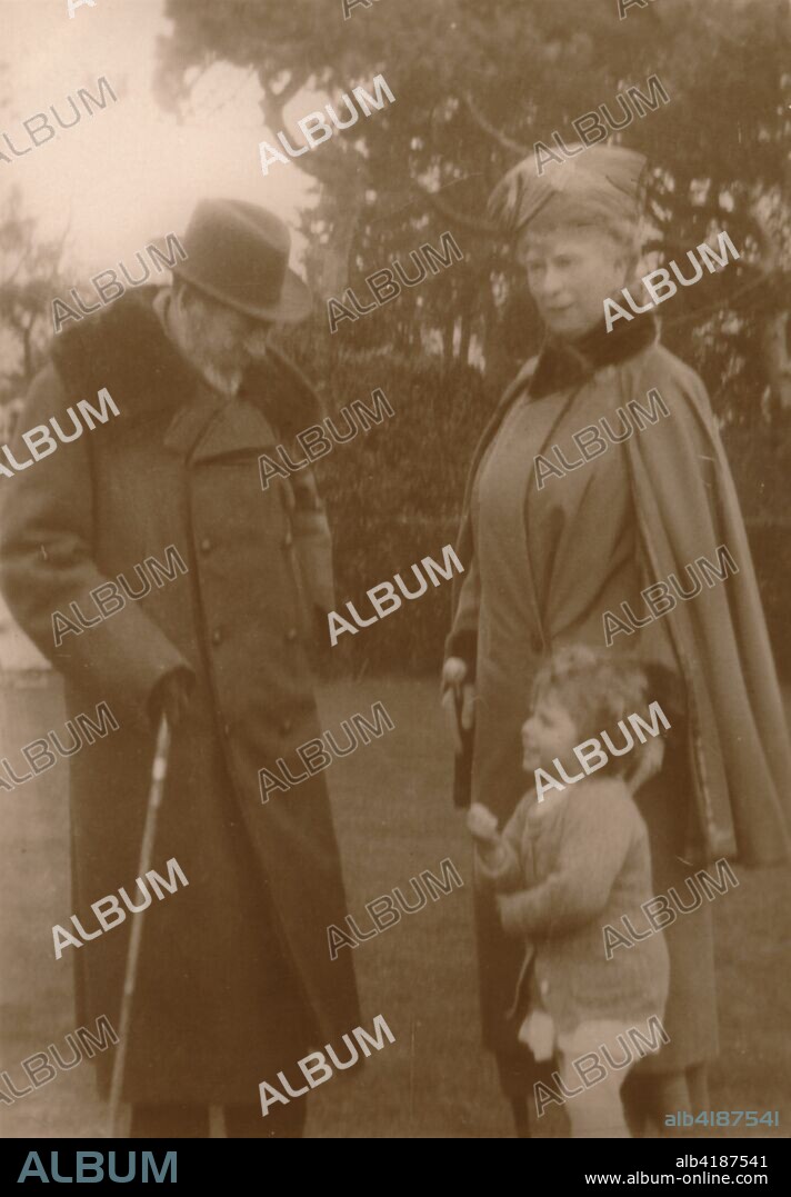 'Their Majesties the King & Queen with the little Princess Elizabeth at Craigweil House, Bognor', c1930. King George V (1865-1936), and Queen Mary of Teck (1867-1953) with their granddaughter the future Queen Elizabeth II (born 1926). [King & Wilson, Bognor, c1930].