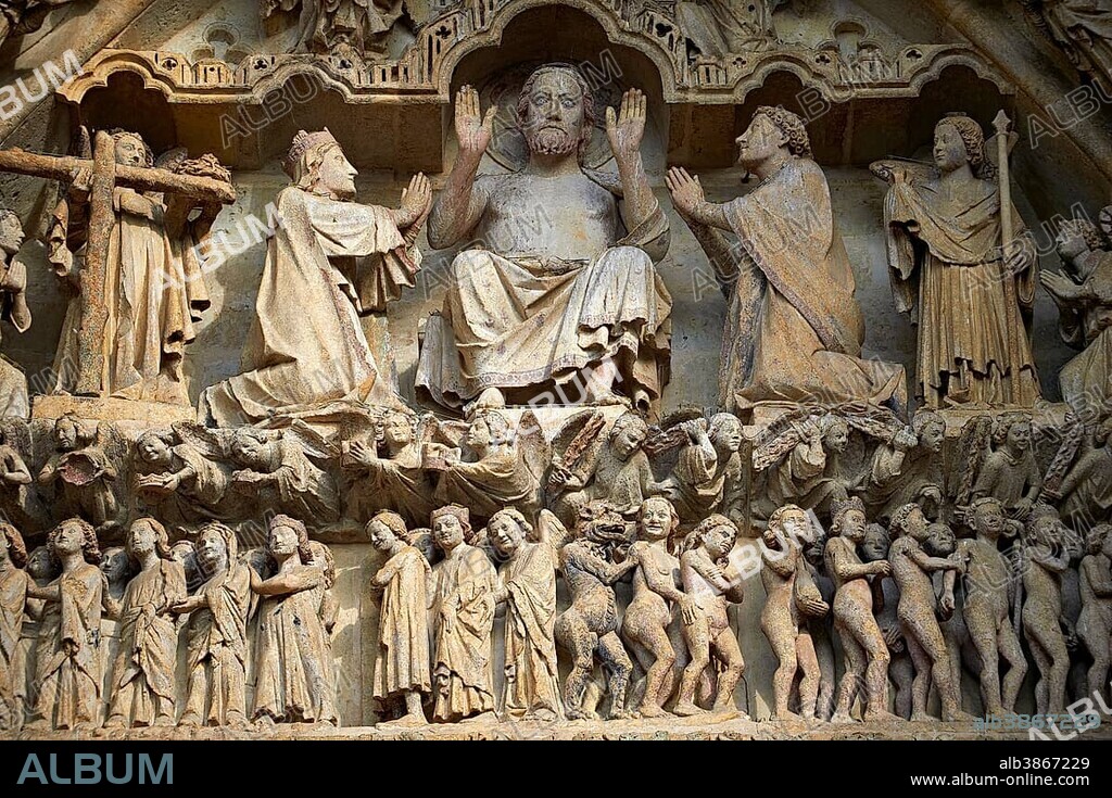 Gothic sculptures on the Tympanum of the central west portal depicting scenes from the Day of Judgement, Amiens Cathedral, Notre Dame d'Amiens, UNESCO World Heritage Site, Amiens, France