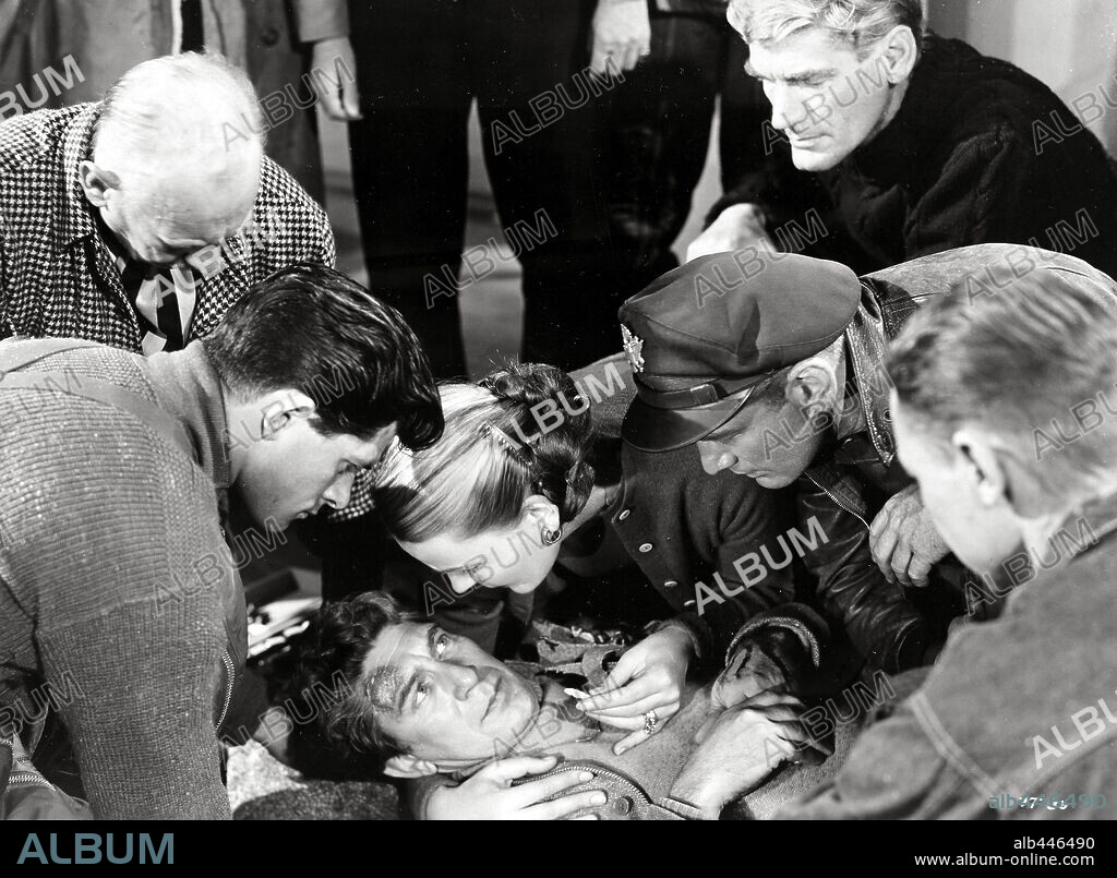 DEWEY MARTIN, EDUARD FRANZ, KENNETH TOBEY and MARGARET SHERIDAN in THE THING FROM ANOTHER WORLD, 1951, directed by HOWARD HAWKS. Copyright RKO.