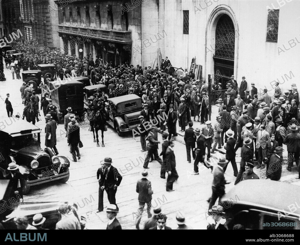 WALL STREET CRASH, 1929.Crowds gathered outside the New York Stock Exchange on Wall Street as stock prices collapse, late October 1929.
