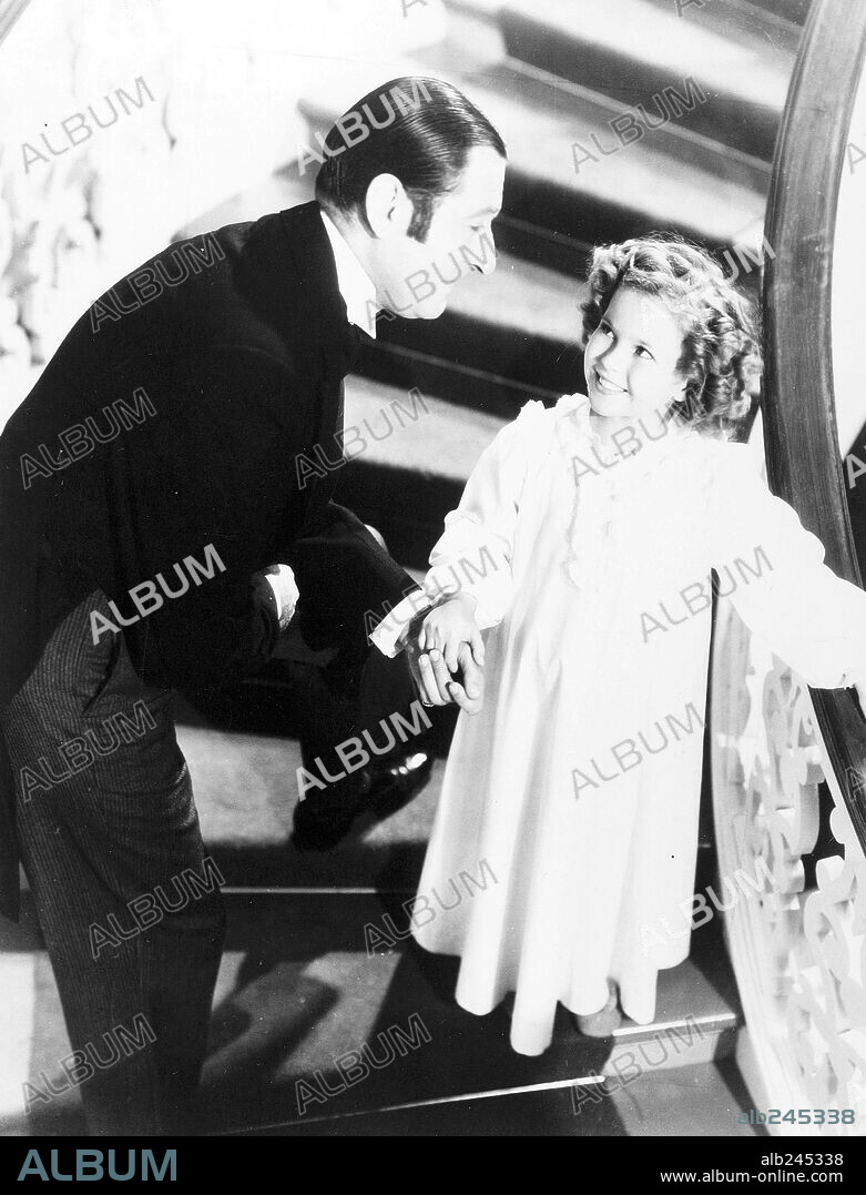 NIÑO PRODIGIO, SHIRLEY TEMPLE and ARTHUR TREACHER. ARTHUR TREACHER and SHIRLEY TEMPLE in HEIDI, 1937, directed by ALLAN DWAN. Copyright 20TH CENTURY FOX.