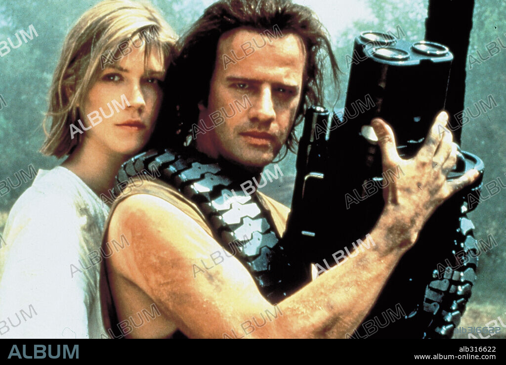 CHRISTOPHER LAMBERT and LORYN LOCKLIN in FORTRESS, 1992, directed by STUART GORDON. Copyright VILLAGE ROADSHOW.