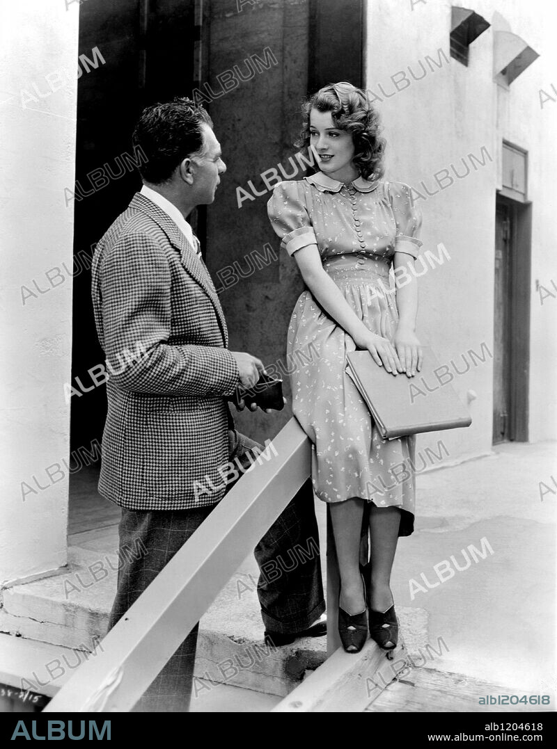 ELLEN DREW and WESLEY RUGGLES in SING YOU SINNERS, 1938, directed by WESLEY RUGGLES. Copyright PARAMOUNT PICTURES.