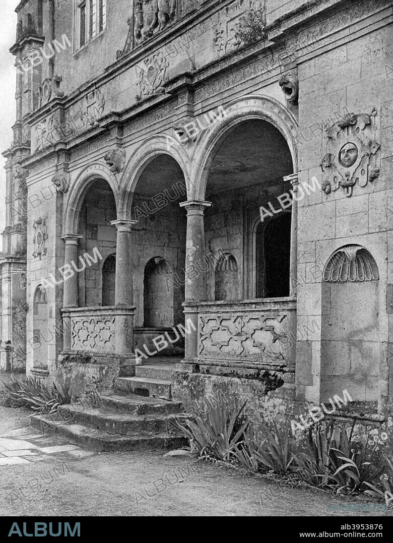 The loggia, Cranborne Manor House, Dorset, 1924-1926. The manor house at Cranborne was originally built in the early 13th century as a hunting lodge for King John. It was acquired in 1605 by Robert Cecil, 1st Earl of Salisbury, who began its transformation into a manor house combining Renaissance features with the existing medieval walls. A print from Hutchinson's Britain Beautiful, edited by Walter Hutchinson, volume II, 1924-1926.
