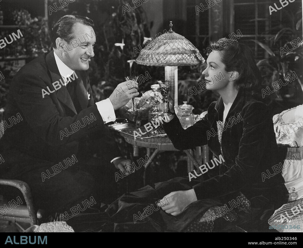 GEORGE SANDERS and GERALDINE FITZGERALD in THE STRANGE AFFAIR OF UNCLE HARRY, 1945, directed by ROBERT SIODMAK. Copyright UNIVERSAL PICTURES.