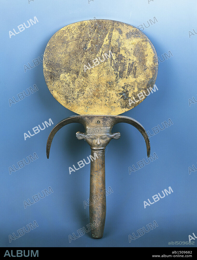 Egyptian civilization, New Kingdom, Dynasty XVIII-XIX. Bronze mirror with Hathor-headed handle. From Gurna.